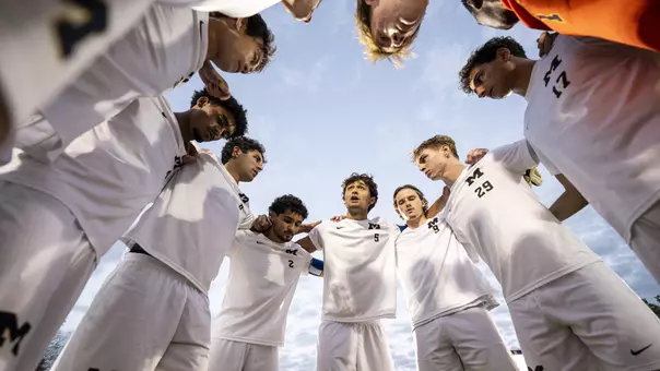 Men's Soccer Team Huddle