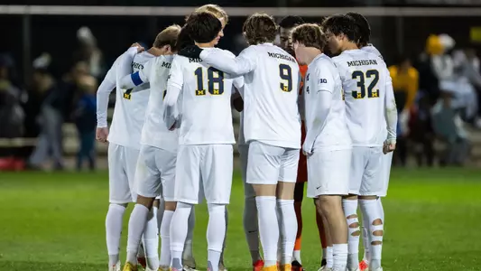 Men's Soccer Group Huddle