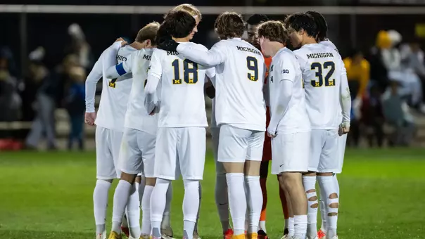 Men's Soccer Group Huddle