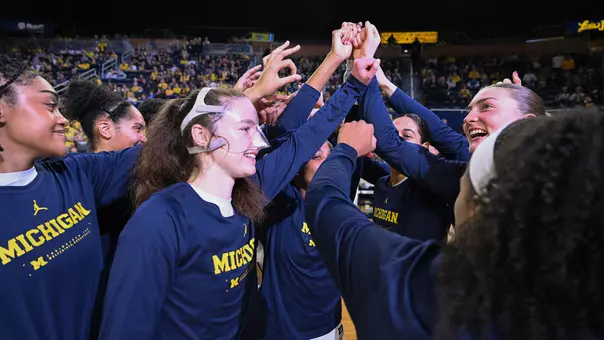 Women's Basketball Team Huddle