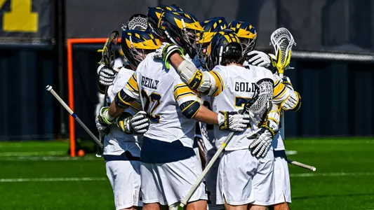 Men's Lacrosse team huddle
