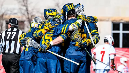 Men's Lacrosse Group Huddle