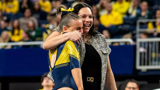 Quincy Walters, left, and head coach Maile'ana Kanewa-Hermelyn