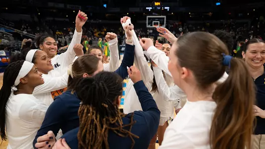 Women's basketball team huddle