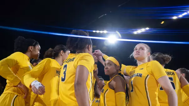 Women's basketball team huddle