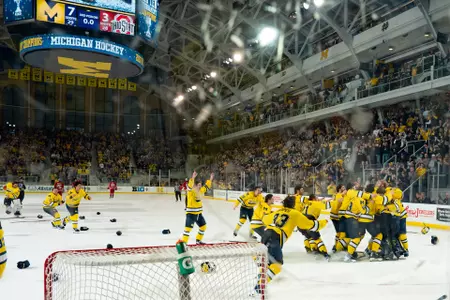Ice hockey team celebration after 2026 Big Ten Tournament title