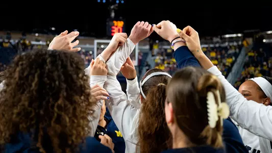 Women's Basketball Team Huddle