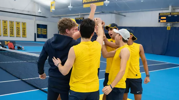 Michigan men's tennis team huddle