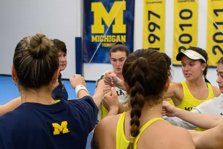 Women's tennis team huddle