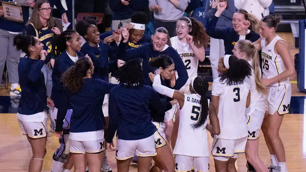 Women's basketball team huddle pregame