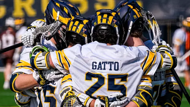 Men's Lacrosse Group Huddle