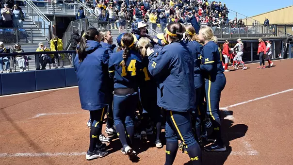 Softball team celebration at the plate versus Ohio State