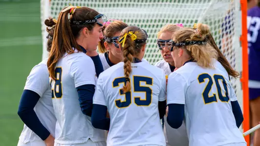Women's Lacrosse Group Huddle