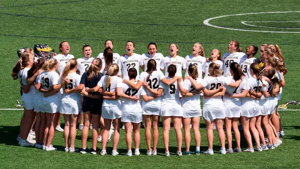 Woomen's Lacrosse Team Huddle