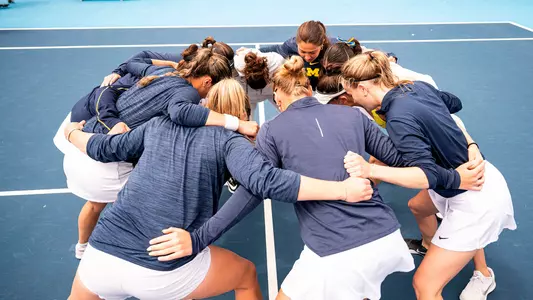 Women's Tennis Team Huddle