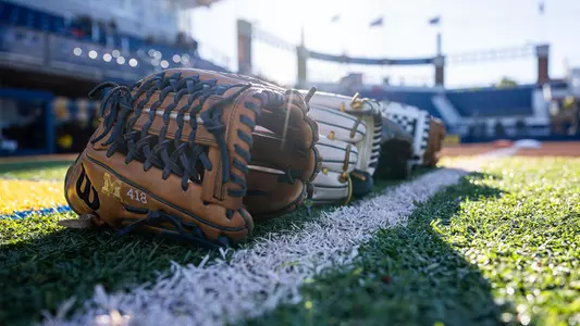 Softball Gloves on First-Base Line
