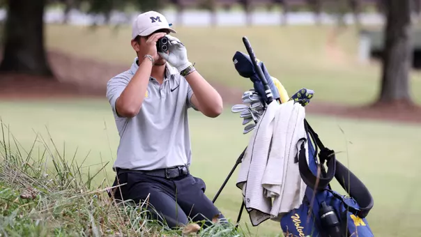 Men's Golf Checking the Distance