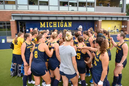 Field hockey team huddle
