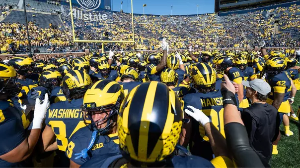 Football Pregame Huddle vs. Iowa