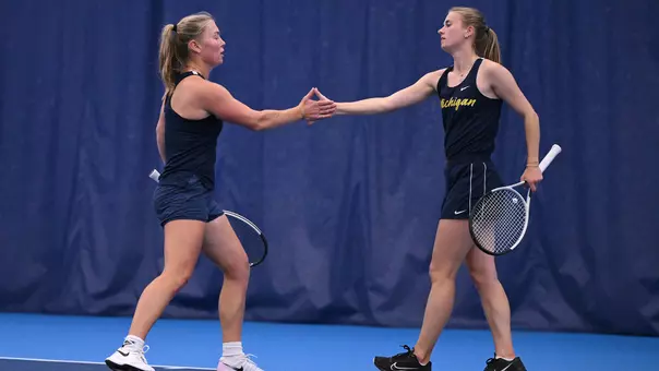 Women's Tennis Doubles Celebration