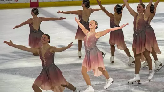 Annie Givens and senior synchronized skating team