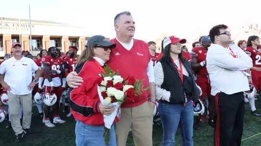 Chuck Martin and family after his 60th win as Miami head coach