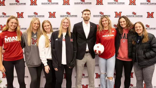 Dan Gwitt and Miami Volleyball players