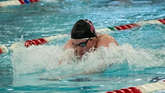 Swimming with pink cap