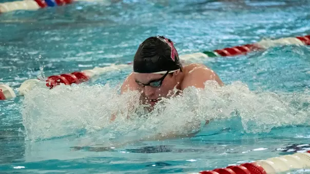 Swimming with pink cap