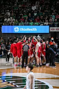Miami Men's Basketball huddle at Ohio