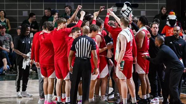 Miami Men's Basketball huddle at Ohio