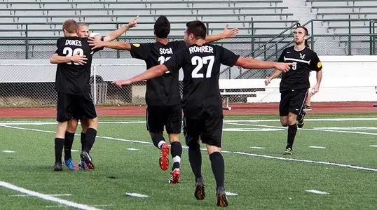 men's soccer celebration