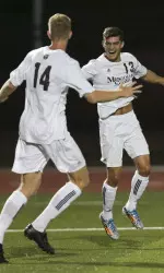 Ryan Navarre celebrates his goal against Missouri Valley College with Jack Wood.