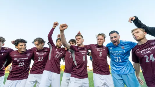 Men's Soccer Team Huddle