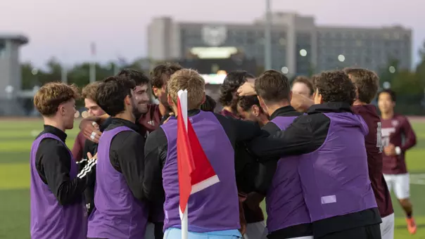 Soccer Team Huddle