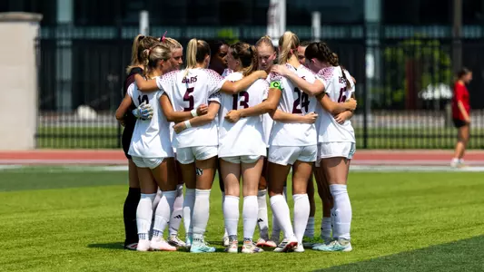 Women's Soccer team huddle