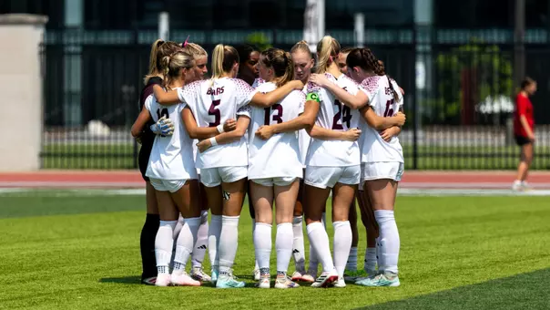 Women's Soccer team huddle