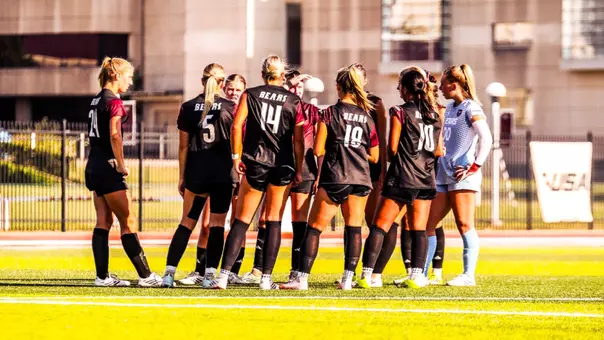 Women's Soccer huddle pic