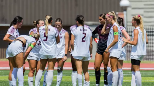 Women's Soccer team huddle