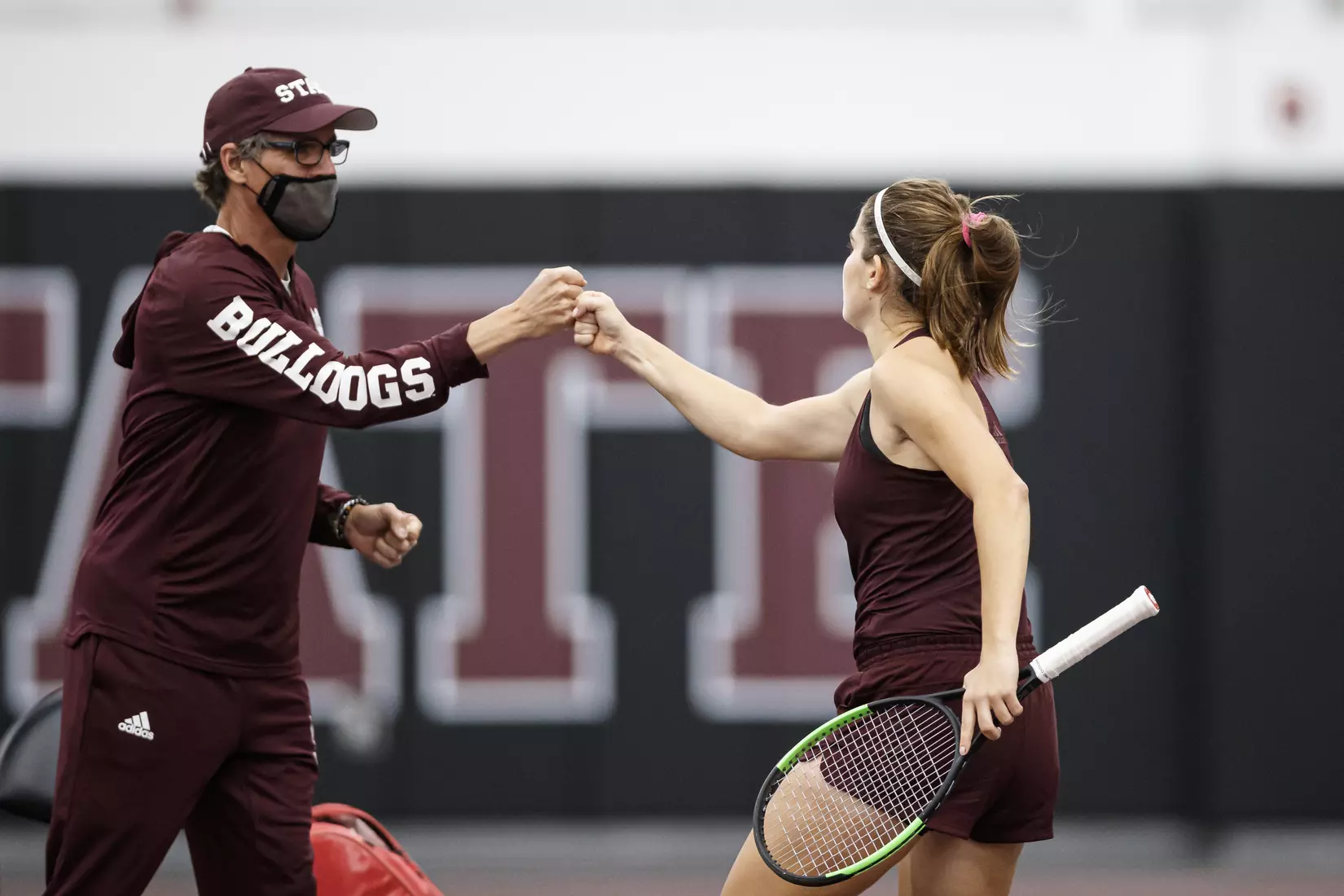 STARKVILLE, MS - March 25, 2021 - Mississippi State Head Coach Daryl Greenan and Magda Adaloglou during the match between the South Carolina Gamecocks and the Mississippi State Bulldogs at the Rula Tennis Pavilion in Starkville, MS. Photo By Austin Perryman