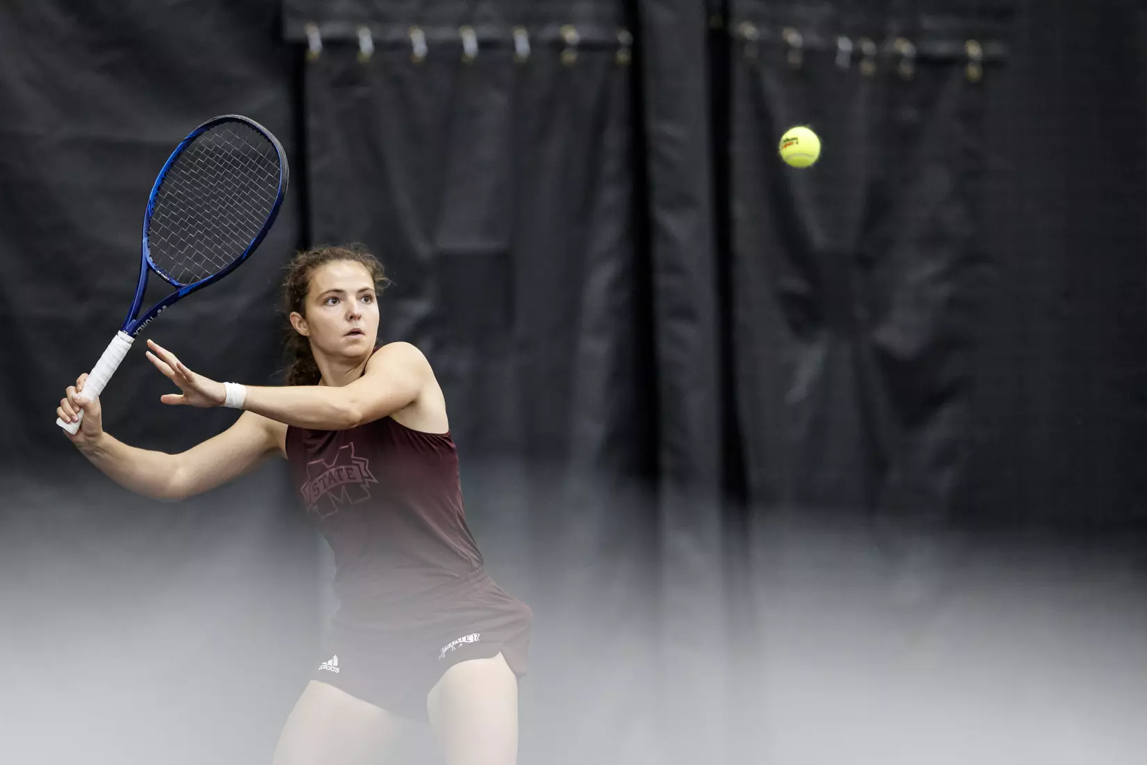 STARKVILLE, MS - March 25, 2021 - Mississippi State's Lilian Poling during the match between the South Carolina Gamecocks and the Mississippi State Bulldogs at the Rula Tennis Pavilion in Starkville, MS. Photo By Austin Perryman