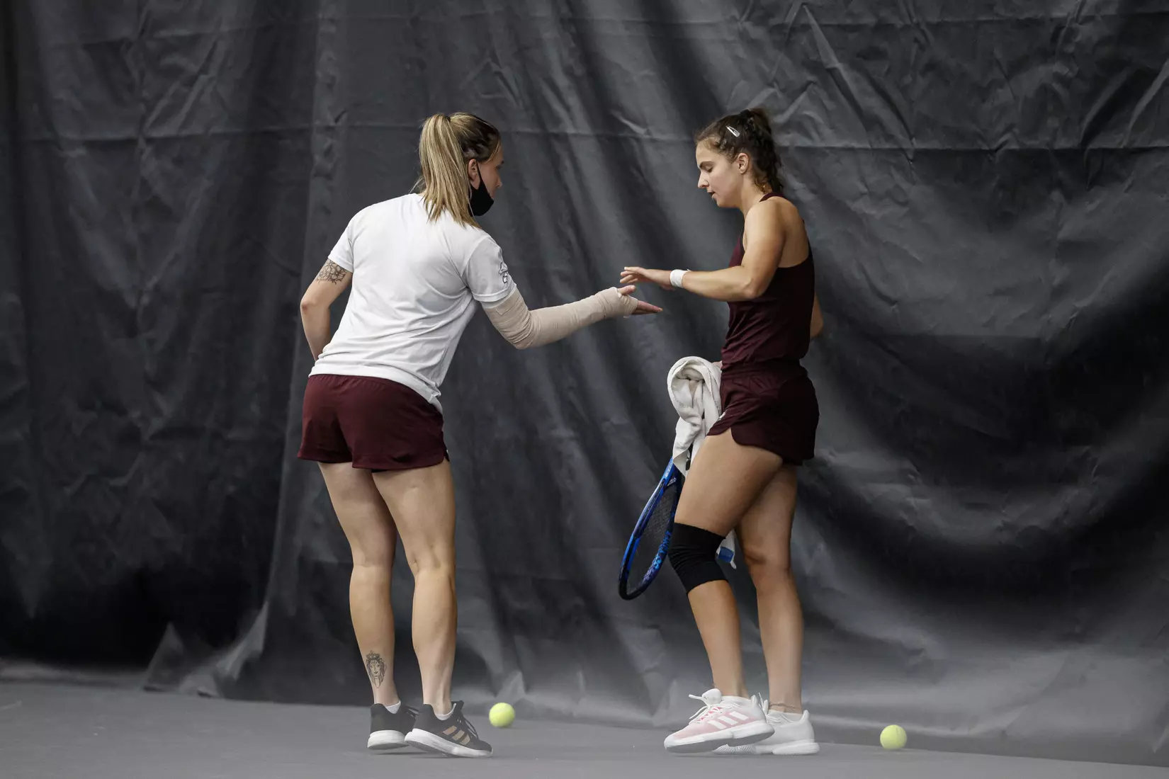 STARKVILLE, MS - March 25, 2021 - Mississippi State's Valeria Nikolaev and Lilian Poling during the match between the South Carolina Gamecocks and the Mississippi State Bulldogs at the Rula Tennis Pavilion in Starkville, MS. Photo By Austin Perryman