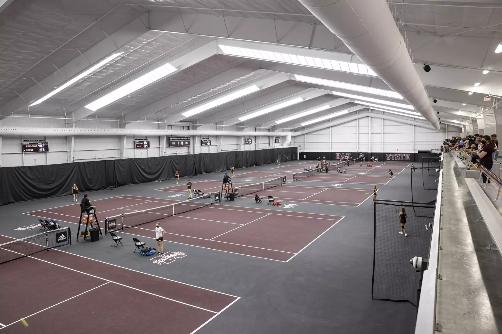 STARKVILLE, MS - March 25, 2021 - Wide angle during the match between the South Carolina Gamecocks and the Mississippi State Bulldogs at the Rula Tennis Pavilion in Starkville, MS. Photo By Austin Perryman