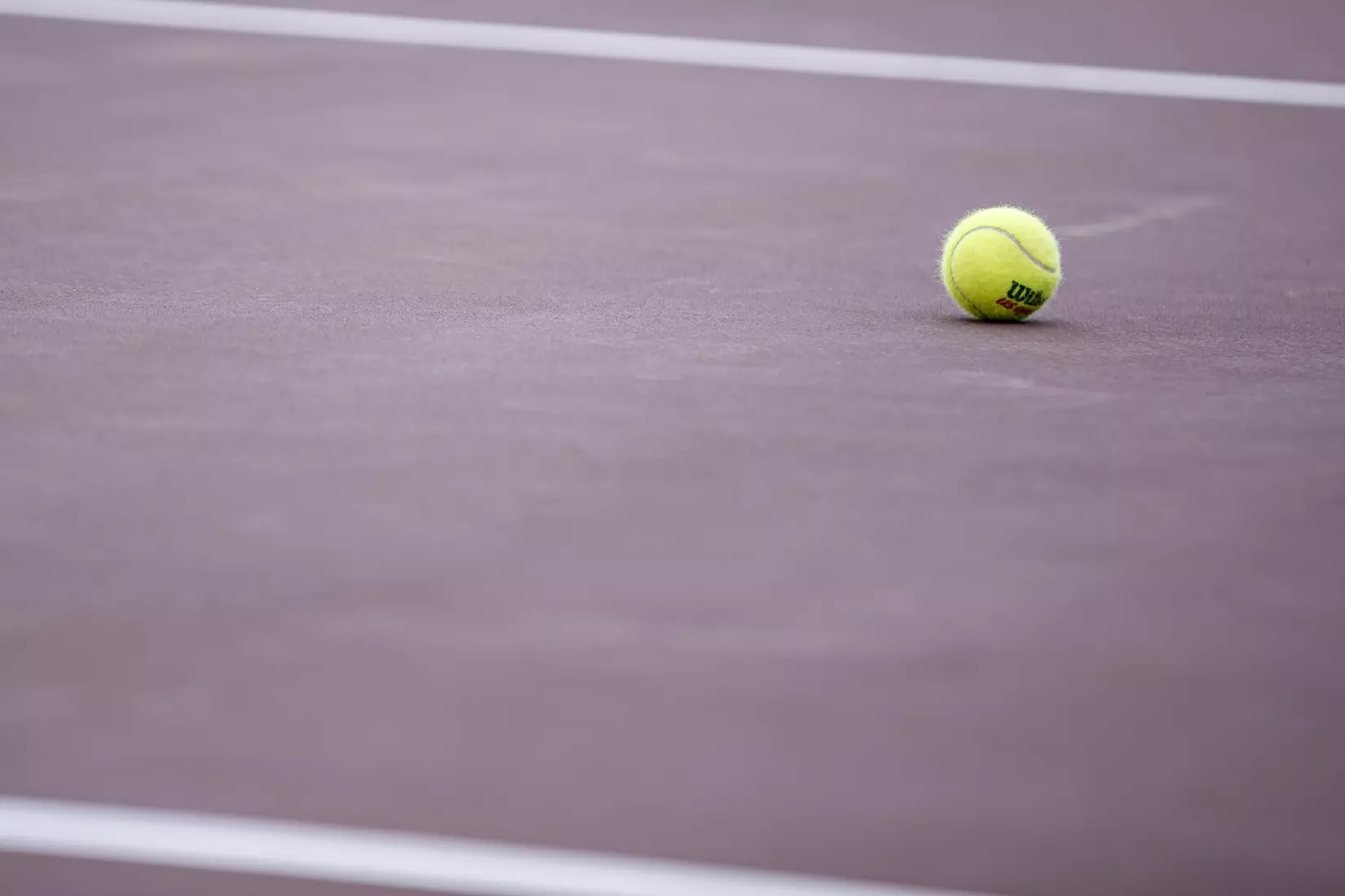 STARKVILLE, MS - MARCH 27, 2021 - Tennis ball before the match between the Florida Gators and the Mississippi State Bulldogs at the AJ Pitts Tennis Centre in Starkville, MS. Photo By Sarah Triplett