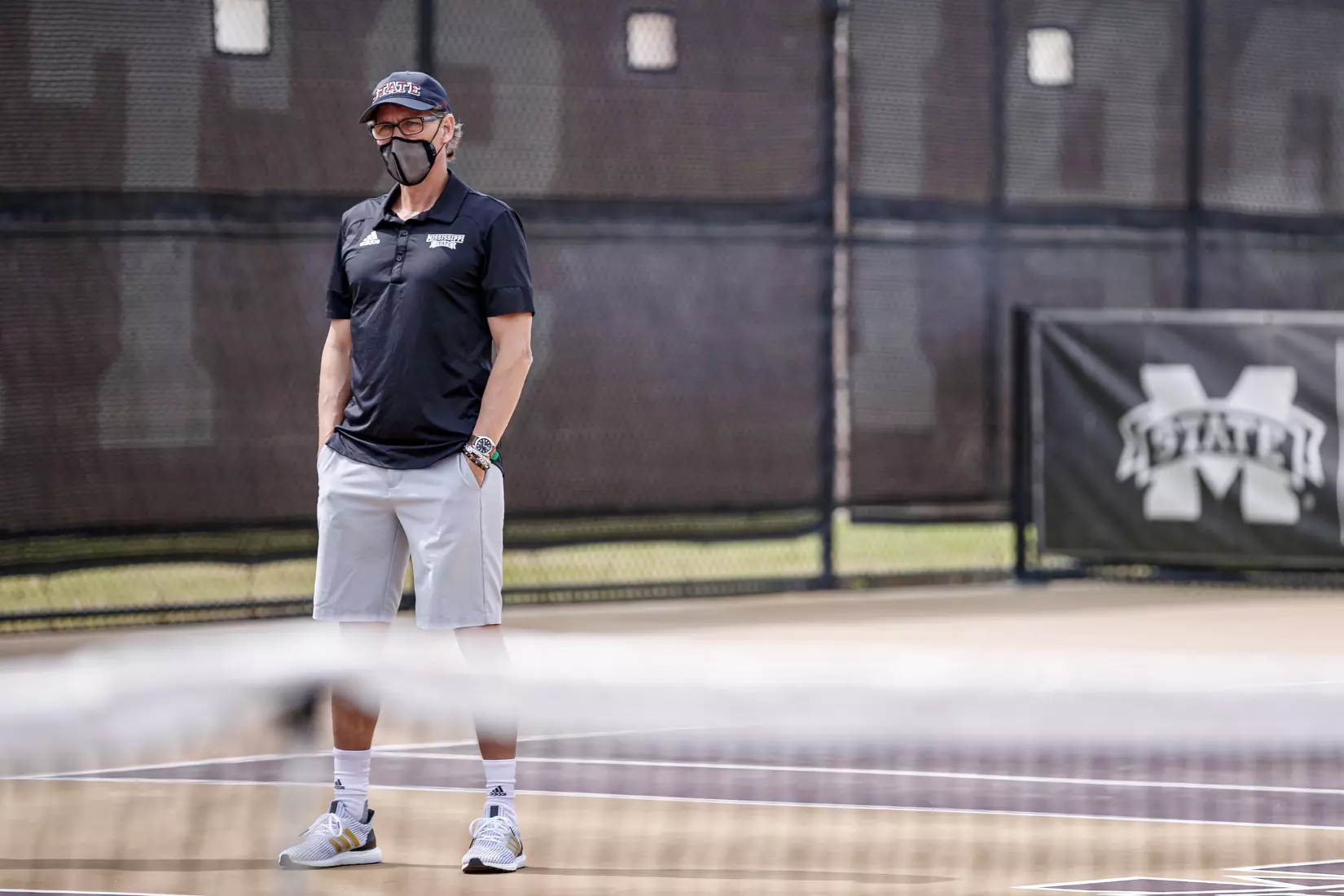 STARKVILLE, MS - MARCH 27, 2021 - Head Coach Daryl Greenan before the match between the Florida Gators and the Mississippi State Bulldogs at the AJ Pitts Tennis Centre in Starkville, MS. Photo By Sarah Triplett