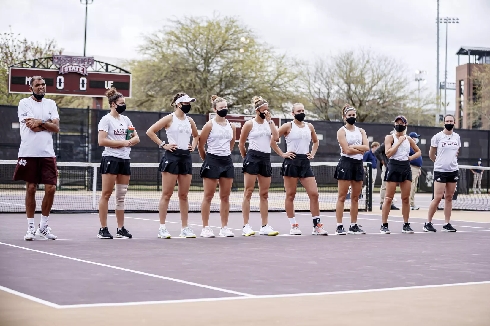 STARKVILLE, MS - MARCH 27, 2021 - Team before the match between the Florida Gators and the Mississippi State Bulldogs at the AJ Pitts Tennis Centre in Starkville, MS. Photo By Sarah Triplett