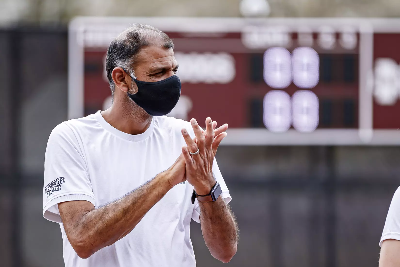 STARKVILLE, MS - MARCH 27, 2021 - Assistant Head Coach Sachin Kirtane before the match between the Florida Gators and the Mississippi State Bulldogs at the AJ Pitts Tennis Centre in Starkville, MS. Photo By Sarah Triplett