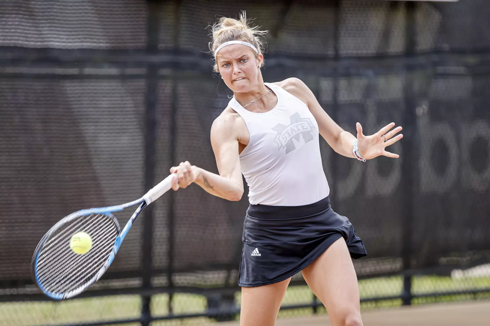 STARKVILLE, MS - MARCH 27, 2021 - Chloe Cirotte during the match between the Florida Gators and the Mississippi State Bulldogs at the AJ Pitts Tennis Centre in Starkville, MS. Photo By Sarah Triplett