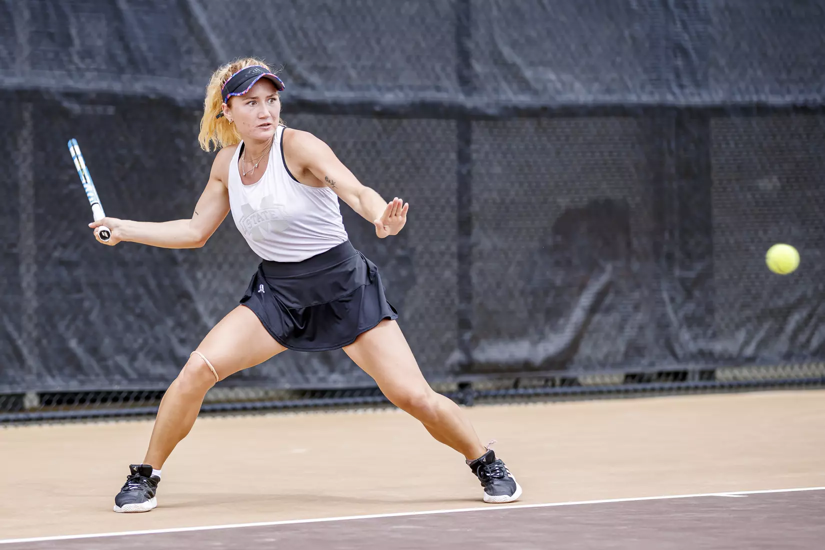 STARKVILLE, MS - MARCH 27, 2021 - Tamara Racine during the match between the Florida Gators and the Mississippi State Bulldogs at the AJ Pitts Tennis Centre in Starkville, MS. Photo By Sarah Triplett