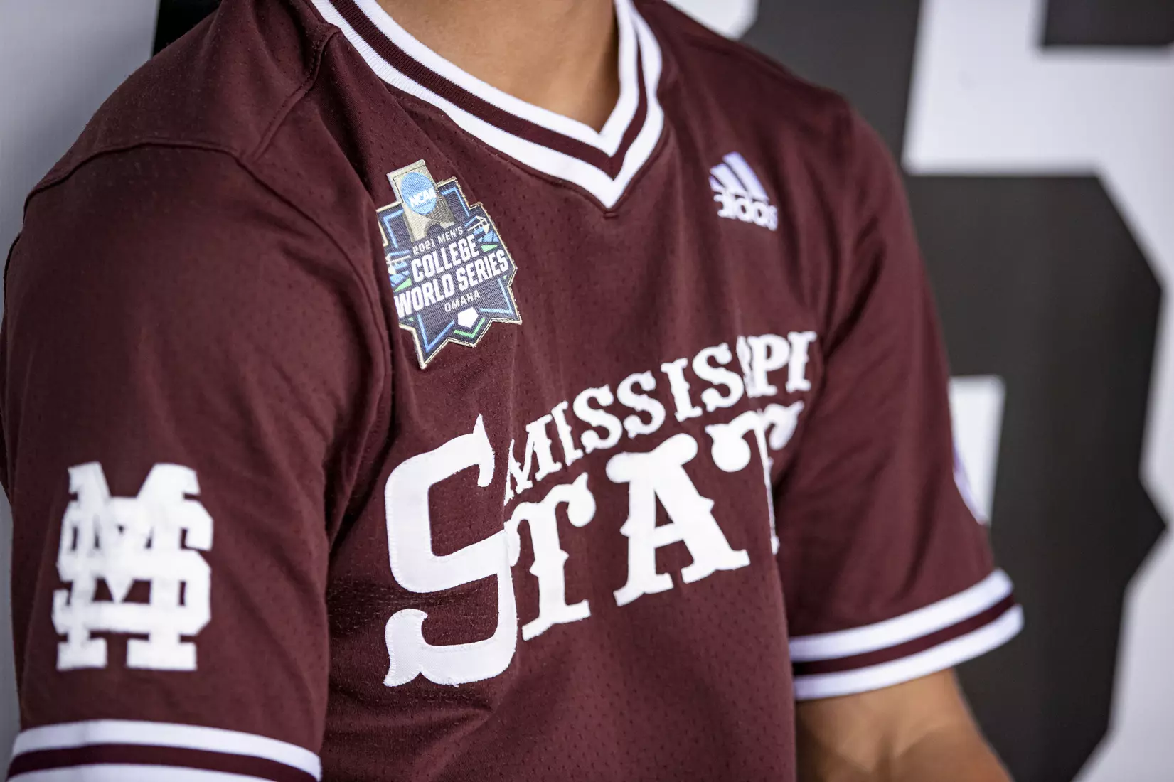 OMAHA, NE - June 22, 2021 - A 2021 Mens College World Series Patch is on a maroon 85 jersey before the 2021 Mens College World Series game between the Mississippi State Bulldogs and the Virginia Cavaliers at TD Ameritrade Park in Omaha, NE. Photo By Austin Perryman